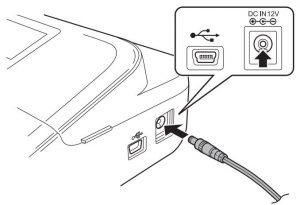 FIG 10 Utilisation de l'adaptateur CA (AD-E001)