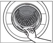 Miele Washing machine User Manual - Vérifiez que les plis du joint de la porte ne contiennent pas de petits objets.